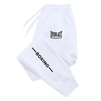 Pantaloni sportivi EVERLAST autunno/inverno 2025, unisex, con stampa, ideali per running, fitness e attività all’aperto. Joggers casual in tessuto felpato, comodi per lo sport e il tempo libero.