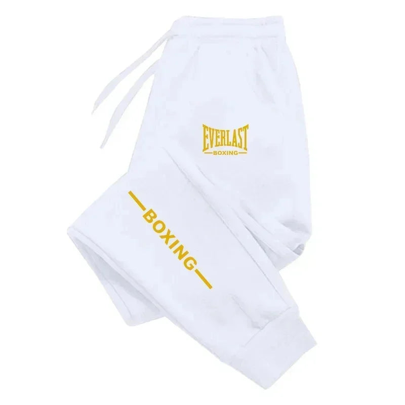 Pantaloni sportivi EVERLAST autunno/inverno 2025, unisex, con stampa, ideali per running, fitness e attività all’aperto. Joggers casual in tessuto felpato, comodi per lo sport e il tempo libero.