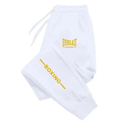 Pantaloni sportivi EVERLAST autunno/inverno 2025, unisex, con stampa, ideali per running, fitness e attività all’aperto. Joggers casual in tessuto felpato, comodi per lo sport e il tempo libero.
